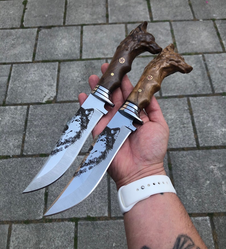 kamperski nož s vučjom glavom